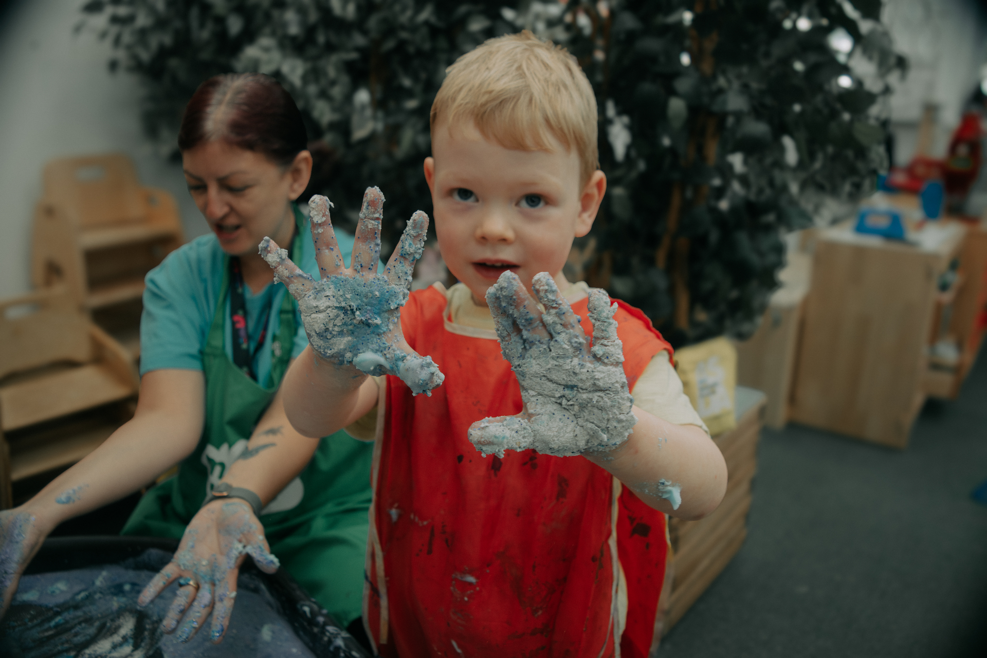 Messy hands during creative play indoors